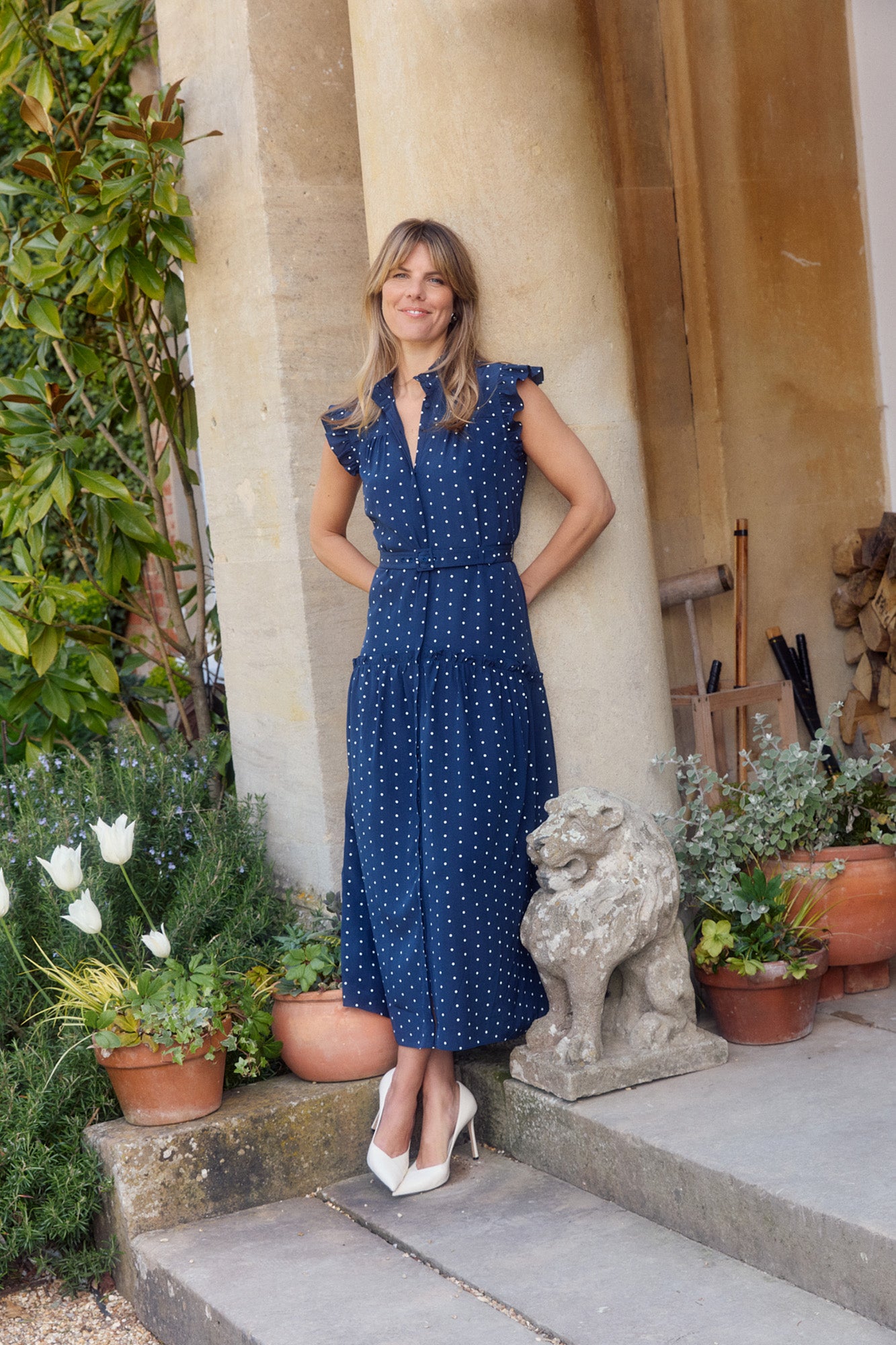 Darsha Navy Polka Dot Sleeveless Dress